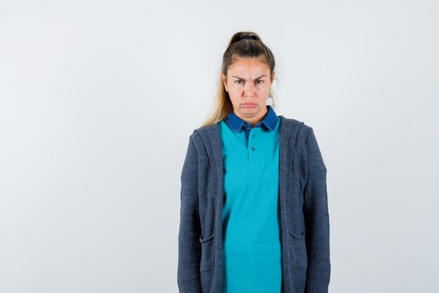 Expressive young girl posing in the studio