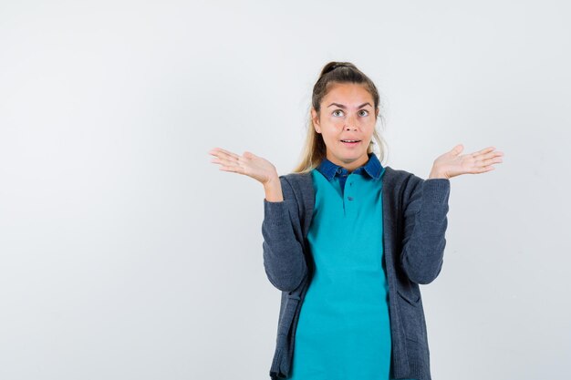 Expressive young girl posing in the studio