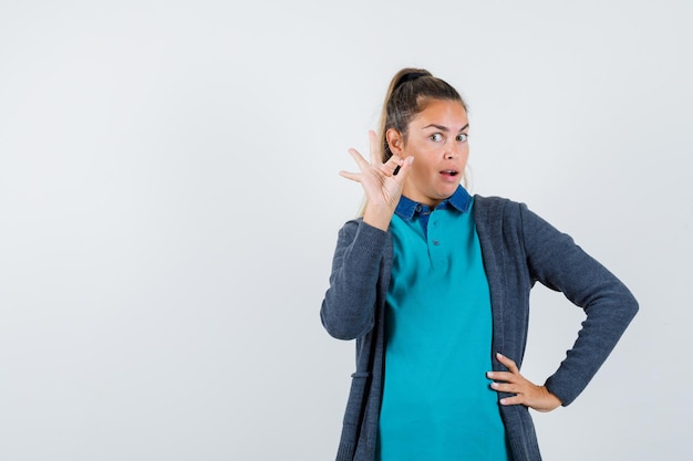 Expressive young girl posing in the studio