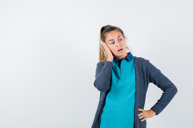 Expressive young girl posing in the studio