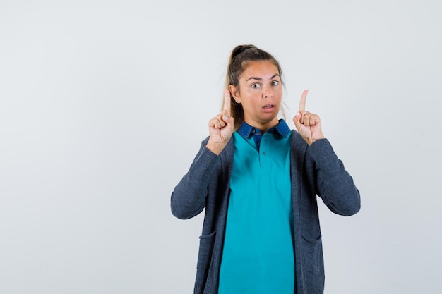 Expressive young girl posing in the studio