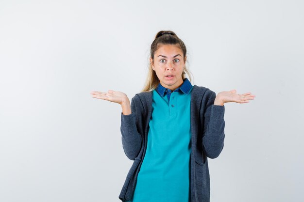 Expressive young girl posing in the studio