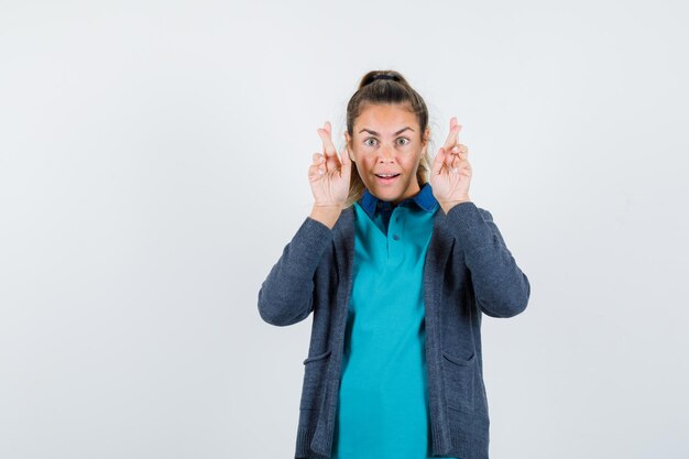 Expressive young girl posing in the studio