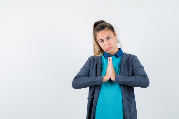 Expressive young girl posing in the studio