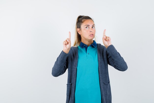 Expressive young girl posing in the studio