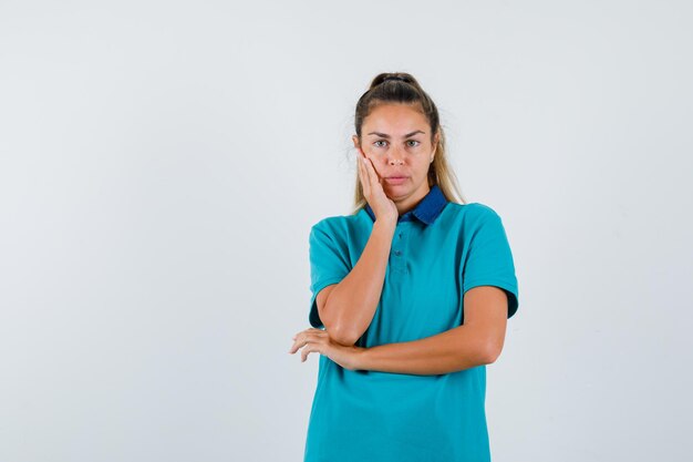 Expressive young girl posing in the studio