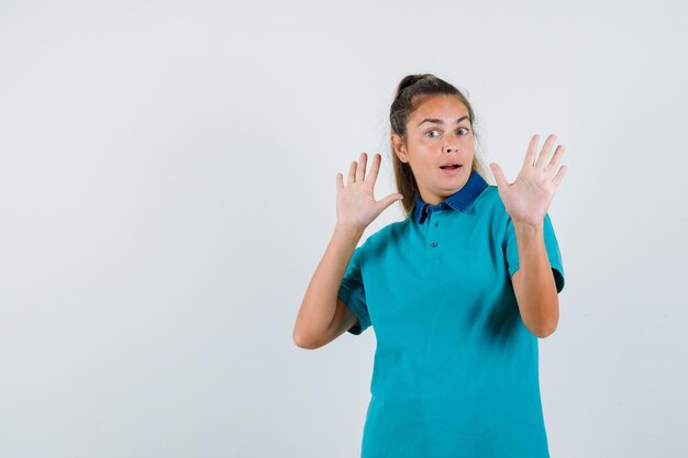 Expressive young girl posing in the studio