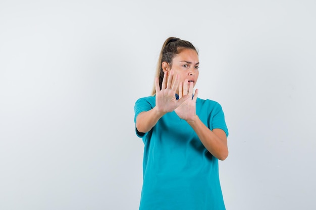 Expressive young girl posing in the studio