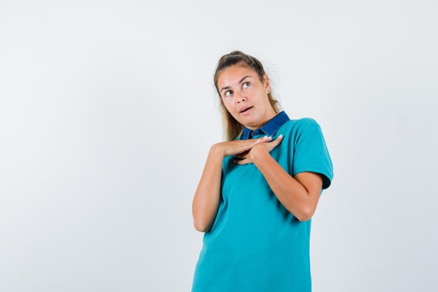 Expressive young girl posing in the studio