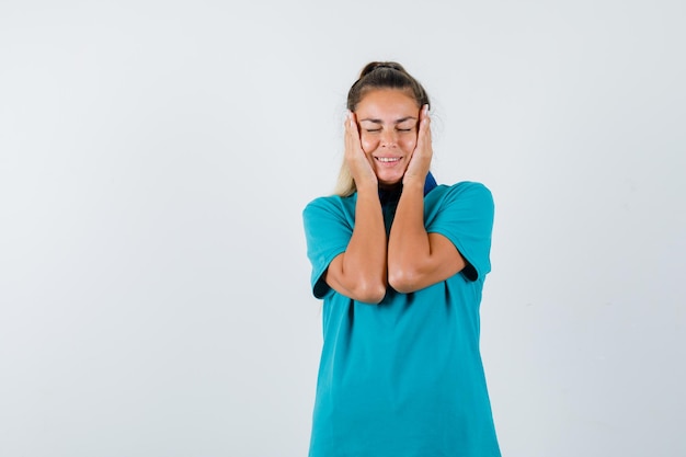 Expressive young girl posing in the studio