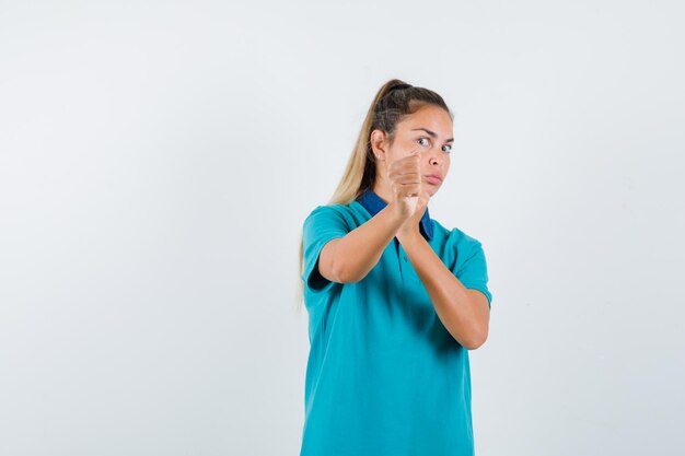 Expressive young girl posing in the studio