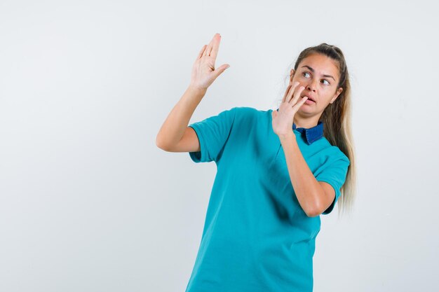 Expressive young girl posing in the studio