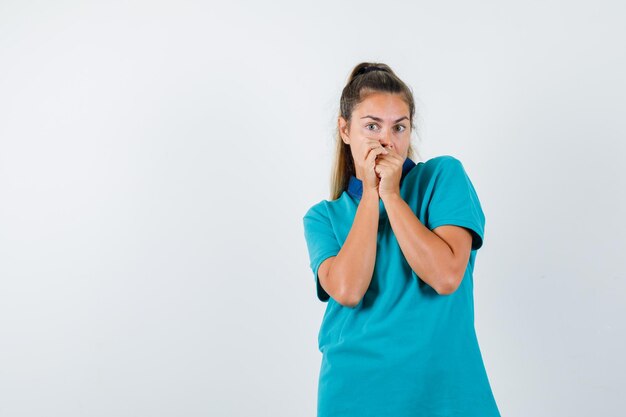 Expressive young girl posing in the studio