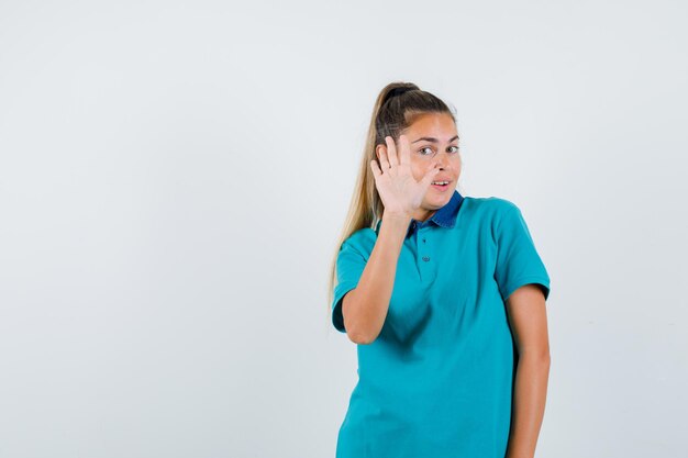 Expressive young girl posing in the studio