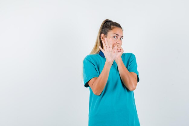 Expressive young girl posing in the studio