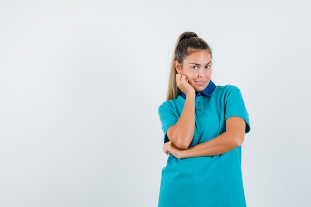 Expressive young girl posing in the studio