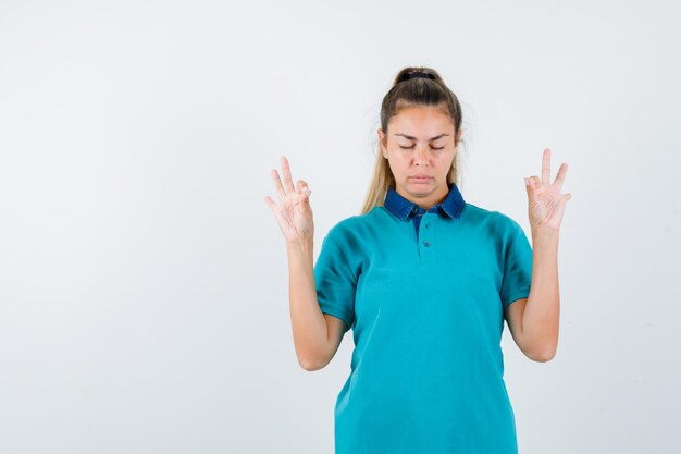 Expressive young girl posing in the studio