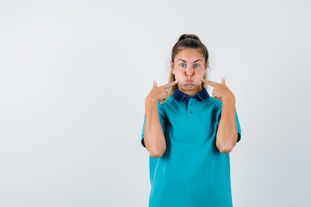 Expressive young girl posing in the studio