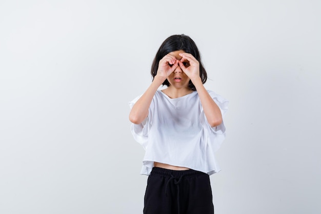 Expressive young girl posing in the studio