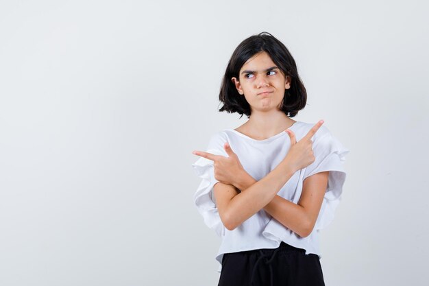 Expressive young girl posing in the studio