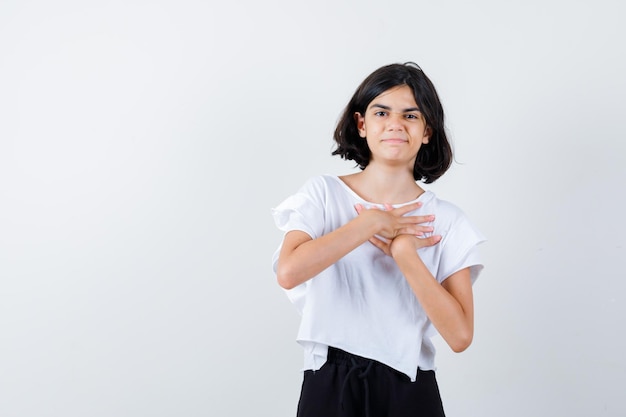 Expressive young girl posing in the studio