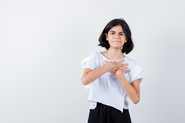 Expressive young girl posing in the studio