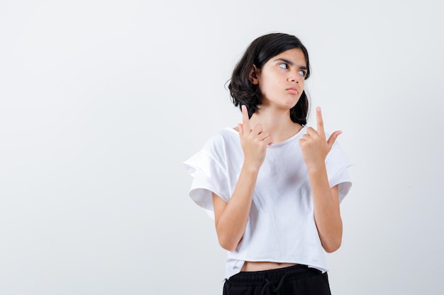 Expressive young girl posing in the studio