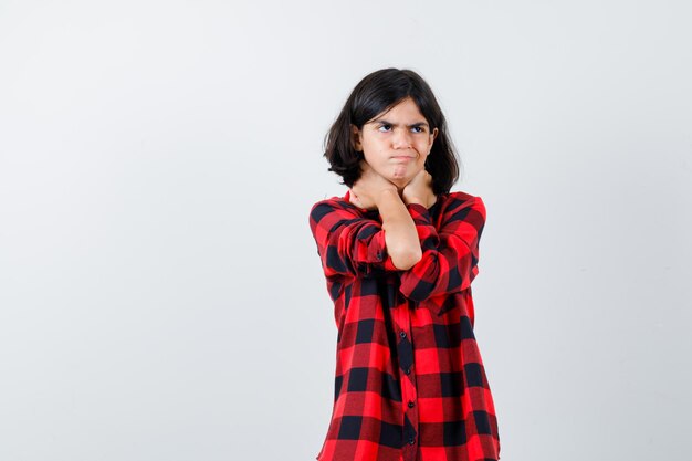 Expressive young girl posing in the studio