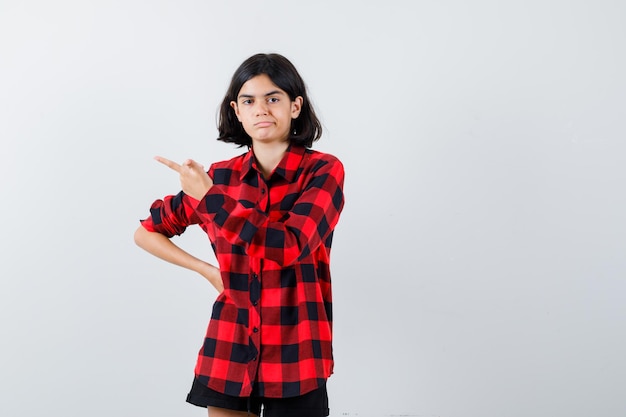 Expressive young girl posing in the studio