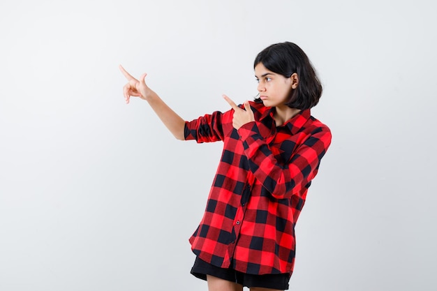 Expressive young girl posing in the studio