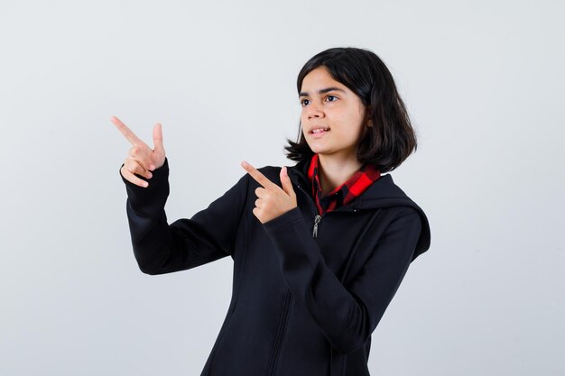 Expressive young girl posing in the studio