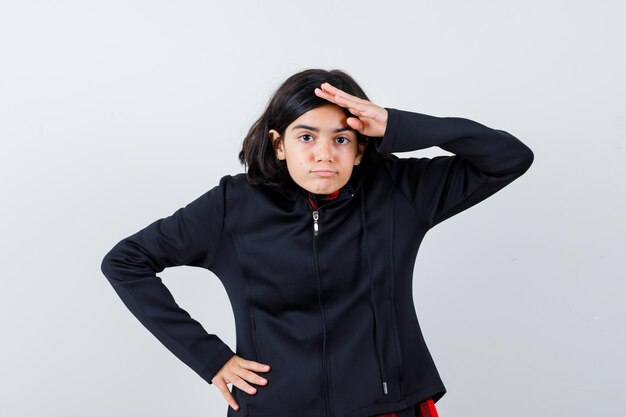 Expressive young girl posing in the studio