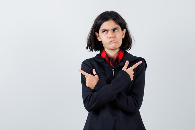 Expressive young girl posing in the studio