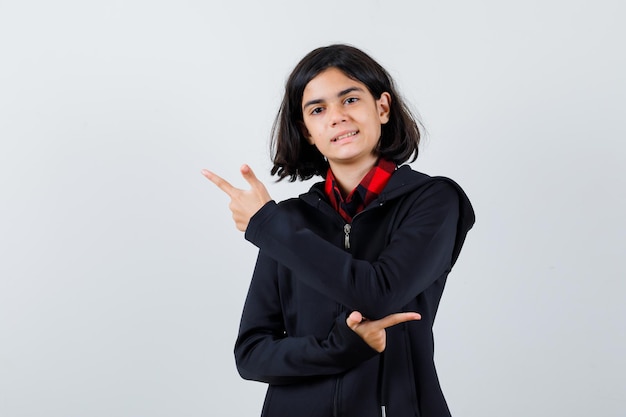 Expressive young girl posing in the studio