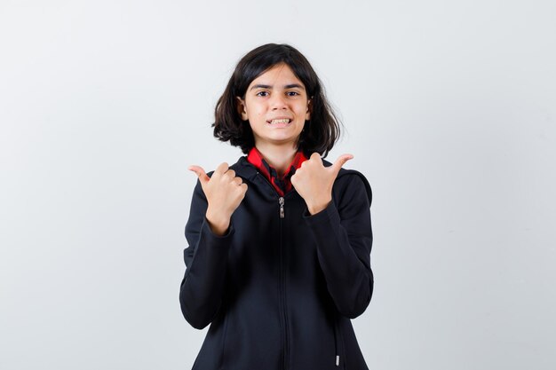 Expressive young girl posing in the studio