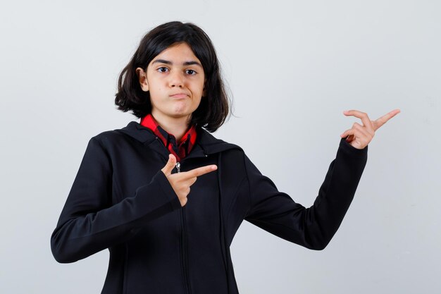 Expressive young girl posing in the studio