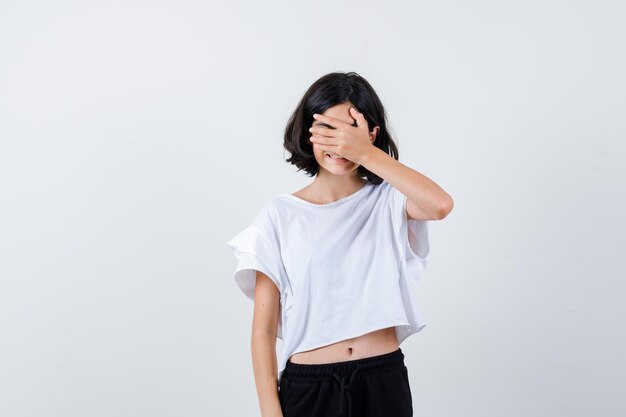 Expressive young girl posing in the studio