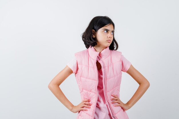 Expressive young girl posing in the studio