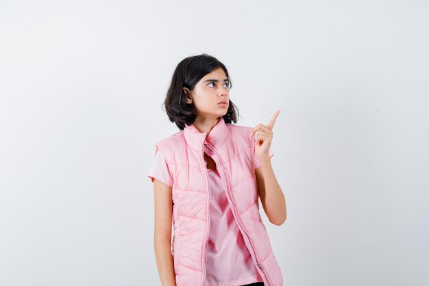 Expressive young girl posing in the studio