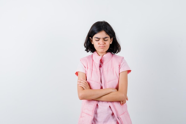 Expressive young girl posing in the studio