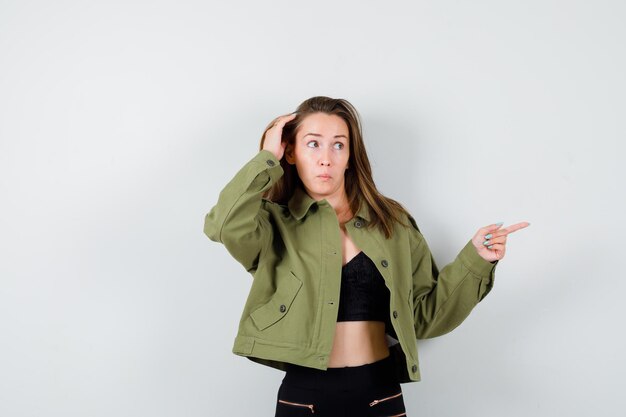 Expressive young girl posing in the studio