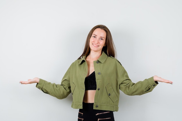 Expressive young girl posing in the studio