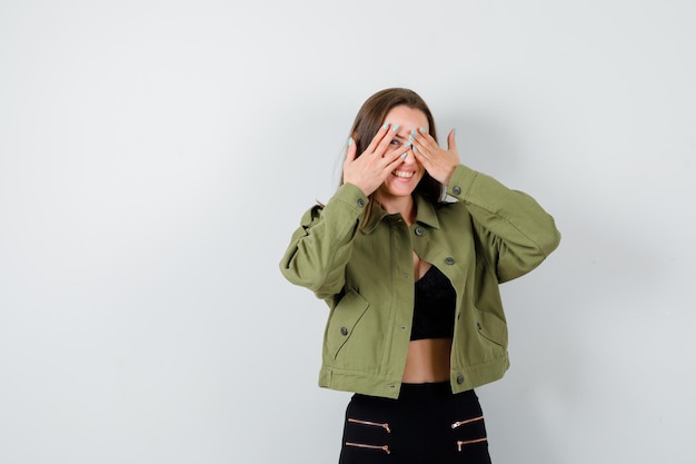 Expressive young girl posing in the studio