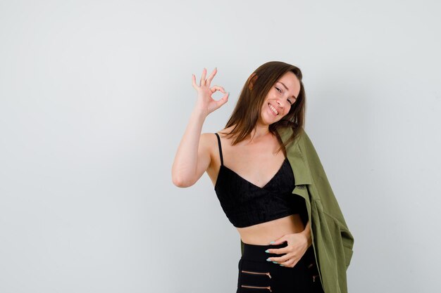 Expressive young girl posing in the studio