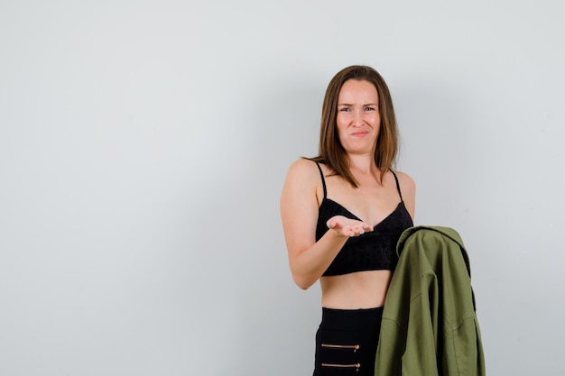 Expressive young girl posing in the studio