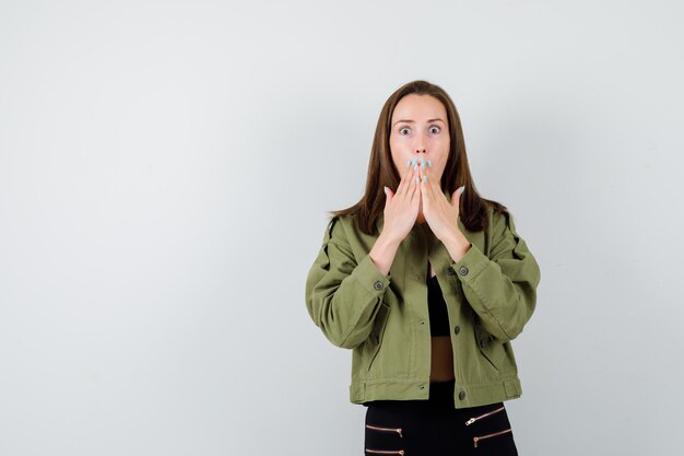 Expressive young girl posing in the studio