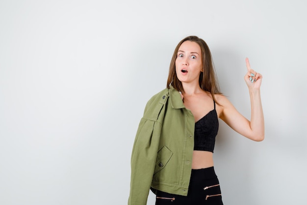 Expressive young girl posing in the studio