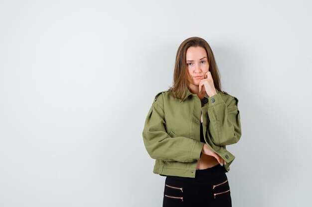 Expressive young girl posing in the studio