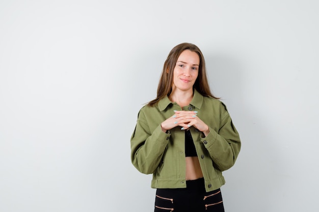 Expressive young girl posing in the studio