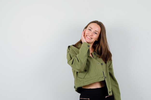 Expressive young girl posing in the studio